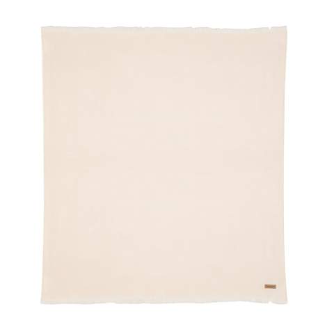 Give your home a stylish upgrade with this Ukiyo Aware™ Polylana® woven blanket. This high quality blanket is woven with fringed edges. Keep it on your sofa for cosy movie nights or on your bed for a beautiful layered look. With AWARE™ tracer that validates the genuine use of recycled materials. 2% of proceeds of each product sold containing AWARE™ will be donated to Water.org.