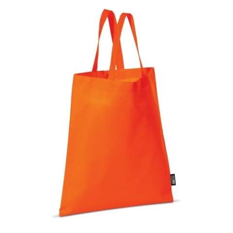 Coloured non-woven carrier bag with short handles. Large print area.