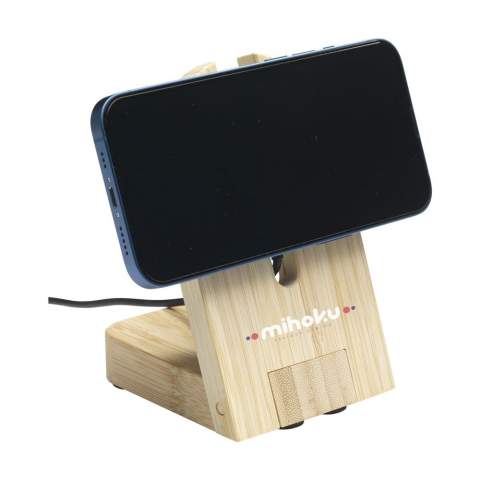 Un support de téléphone à chargement rapide magnétique sans fil de 15 W. Fabriqué à partir de bambou, ce chargeur rapide convient aux modèles d'iPhone 12 et plus récents. Placez le téléphone sur le support et le chargeur magnétique reconnaîtra l'aimant de l'iPhone et commencera à charger automatiquement.  Inclus : un câble USB-C et un chargeur mural USB-C 20 W nécessaires pour alimenter ce produit. Chaque article est fourni dans une boite individuelle en papier kraft marron.