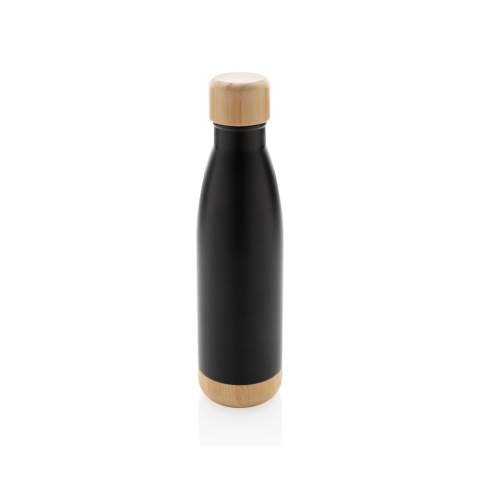 When you're looking forward to your favourite beverage, you can count on this vacuum stainless steel bottle. Whether you're sitting at your desk or taking a walk you can easily take your bottle with you wherever you go. The bottle features a bamboo lid and bottom accent for some extra style. Capacity 520ml.<br /><br />HoursHot: 5<br />HoursCold: 15