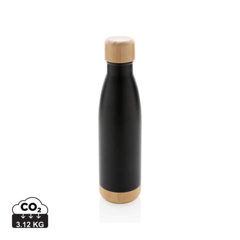 When you're looking forward to your favourite beverage, you can count on this vacuum stainless steel bottle. Whether you're sitting at your desk or taking a walk you can easily take your bottle with you wherever you go. The bottle features a bamboo lid and bottom accent for some extra style. Capacity 520ml.<br /><br />HoursHot: 5<br />HoursCold: 15
