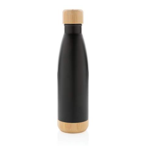 When you're looking forward to your favourite beverage, you can count on this vacuum stainless steel bottle. Whether you're sitting at your desk or taking a walk you can easily take your bottle with you wherever you go. The bottle features a bamboo lid and bottom accent for some extra style. Capacity 520ml.<br /><br />HoursHot: 5<br />HoursCold: 15