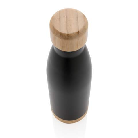 When you're looking forward to your favourite beverage, you can count on this vacuum stainless steel bottle. Whether you're sitting at your desk or taking a walk you can easily take your bottle with you wherever you go. The bottle features a bamboo lid and bottom accent for some extra style. Capacity 520ml.<br /><br />HoursHot: 5<br />HoursCold: 15