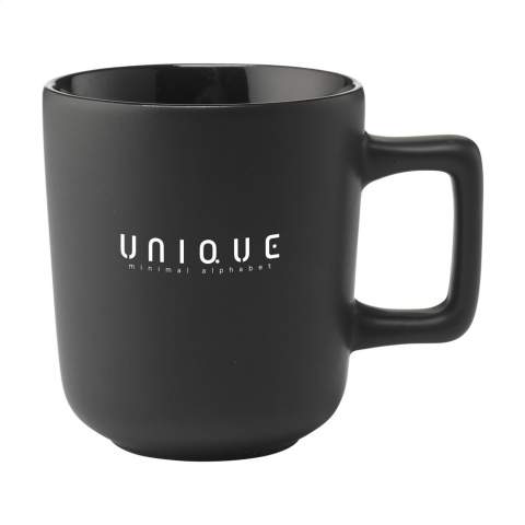 High-quality ceramic mug with a striking handle. Finished with a matte exterior and a high-gloss interior. Dishwasher-safe. The imprint is tested and certified dishwasher-safe: EN 12875-2. Capacity 280 ml.