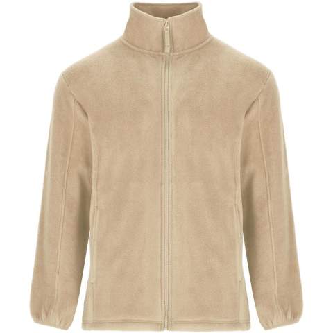 Fleece jacket with high lined collar and matching reinforced covered seams. Injected zip with matching puller made of fabric. Side pockets. Cuffs with elastic trim. Bottom hem with inner side adjusters. Removable label. The model is 185 cm and is wearing size M.