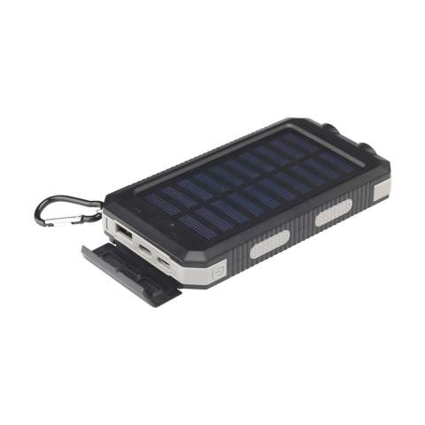Stoere outdoor solar 8.000 mAh powerbank met een behuizing van gerecycled ABS met beschermende siliconen stootranden op de hoeken. Voorzien van een solar panel, geïntegreerd kompas, LED indicatielampjes, LED zaklamp en karabijnhaak. Spatwaterdicht en stofbestendig. Geschikt voor het opladen van de meest gangbare smartphones en andere devices. Input: Type-C DC5V/2.1A. Output: Type-C DC5V/2.1A. 1 x USB-A poort en 2 x USB-C poort. Input solar: 200 mAh. Oplaadtijd op zonneenergie ca. 40 uur. Zowel via het stroomnet als via het zonnepaneel op te laden. De ideale, veelzijdige oplader voor buitenactiviteiten. Inclusief USB-C/USB-C oplaadkabel en gebruiksaanwijzing. RCS-gecertificeerd. Totaal gerecycled materiaal 17%. Per stuk in doosje.