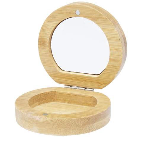 Compact pocket bamboo mirror for travel or daily skincare or makeup use. There is a small compartment at the bottom of the mirror for small accessories. The bamboo used is sourced and produced following sustainable standards.