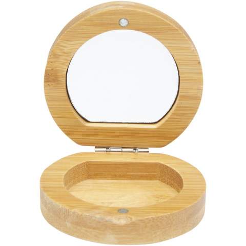 Miroir de poche compact en bambou pour les voyages ou les soins quotidiens de la peau ou le maquillage. Il y a un petit compartiment au bas du miroir pour les petits accessoires. Le bambou utilisé est sélectionné et produit selon des normes durables.