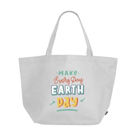 Generous RPET non-woven shopping and beach bag (80 g/m²) made from recycled PET bottles. A wide bag, both strong and light with long handles. Capacity approx. 19 litres.