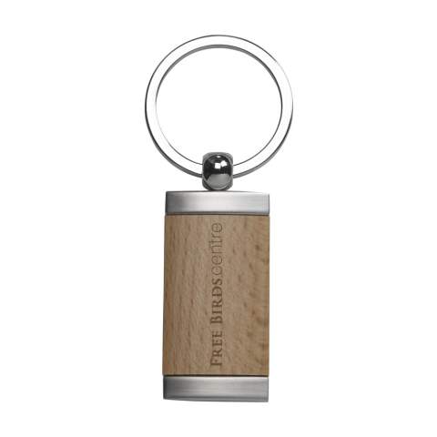 Keyring in matte metal. With beech wooden inlay. On a sturdy metal keyring. Each item is supplied in an individual brown cardboard envelope.