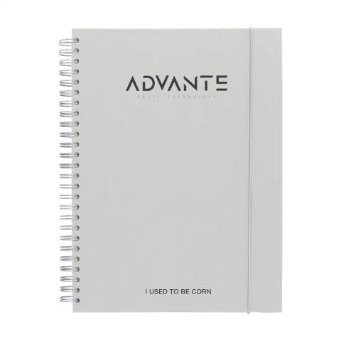 WoW! Bloc-notes au format A5. Avec environ 100 feuilles / 200 pages de papier ligné (80 g/m²), une solide reliure spirale métallique et un élastique de fermeture. La couverture rigide est composée à 15% de déchets agricoles et organiques tels que les tomates, les poivrons, les plantes et les oignons. Ces déchets sont mélangés avec du papier recyclé d'origine européenne. Un carnet pratique pour prendre des notes et noter des idées.