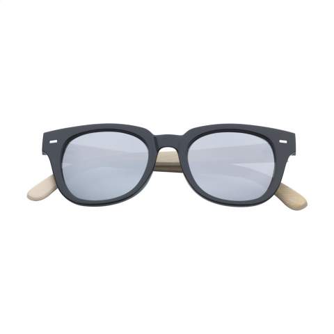 Striking sunglasses with mirrored lenses. The frame of this classic pair is made from sturdy plastic with arms made from eco-friendly bamboo. The mirrored lenses have UV400 protection in line with European standards. Each item is supplied in an individual brown cardboard box.