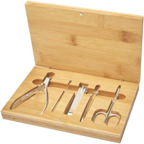 High quality and beautifully made bamboo manicure set with a cuticle nipper (10.3 x 4.3 x 1 cm), ear pick (8 cm), nail clippers for finger and toenails (8 x 1.5 x 1.5 cm), tweezers (8.5 x 0.7 cm), and a pair of scissors (9.5 x 4.2 cm). The bamboo used is sourced and produced following sustainable standards.