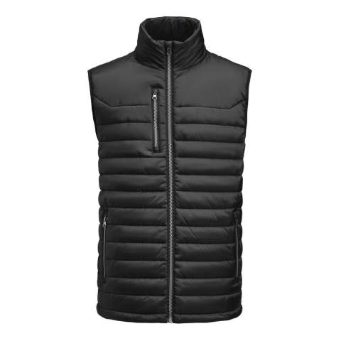 BESCHIKBAAR VANAF EIND NOVEMBER!<br />De Meadows gewatteerde bodywarmer is gemaakt van ripstop buitenstof, vervaardigd uit gecertificeerd gerecycled polyamide. Het moderne ontwerp omvat twee zijzakken met ritssluiting en een borstzak met ritssluiting voor handige en veilige opslag. De voorpas maakt eenvoudige personalisatie mogelijk. De verstelbare zoom met elastisch trekkoord zorgt voor aanpasbaar comfort. Daarnaast heeft de jas binnenin een  opgestikte zak met klittenband.<br />Ҩ Verpakt in een biobased, composteerbare zak en Oeko-Tex Standaard 100 gecertificeerd.