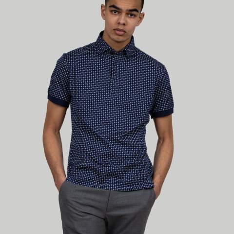 LIMITED EDITION<br />Polo pique is an essential garment in the summer wardrobe. We made a very limited stylish printed edition in a lightweight knitted pique fabric made out of exclusive long staple compact cotton. The classical shirt collar hints of formality, and it makes u looking your best at home office, along the poolside or at the summer- dinner party. <br /><br />Wear it alone or under a blazer, either way it will suit the occasion well.