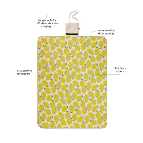 Elevate your outdoor adventures with this GRS certified recycled PET picnic blanket. Featuring a soft fleece surface with a lively lemon pattern and convenient water repellent PEVA backing. The smart design with a cotton canvas flap and long handle, makes the blanket easy to fold and carry, perfect for both the beach or the park. Certified by GRS (Global Recycled Standard), GRS certification guarantees that the entire supply chain of the recycled materials is certified. The total recycled content is based on the overall product weight. This product contains 51% GRS certified recycled PET.