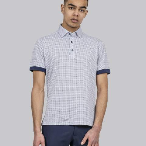 LIMITED EDITION<br />Polo pique is an essential garment in the summer wardrobe. We made a very limited stylish printed edition in a lightweight knitted pique fabric made out of exclusive long staple compact cotton. The classical shirt collar hints of formality, and it makes u looking your best at home office, along the poolside or at the summer- dinner party. <br /><br />Wear it alone or under a blazer, either way it will suit the occasion well.