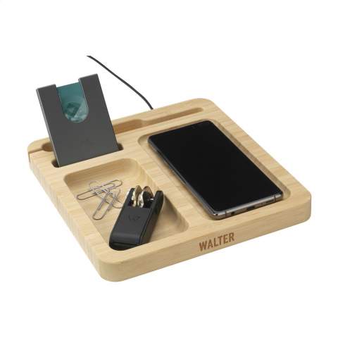 Desk organizer and wireless 15W phone charger in one, with cable with USB-C connector. This desk accessory is made of sustainable bamboo. The built-in magnetic wireless fast charger is compatible with all devices that support Qi wireless charging. Give this organizer a permanent place on your desk and collect your coins, paper clips, stationery, glasses, keys or your wallet. This way, your desk is tidy and all important things are clearly arranged. Includes user manual. Each item is supplied in an individual brown cardboard box.