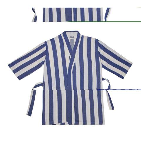 Bring this soft and comfortable hammam robe to the beach or simply enjoy it at home. Crafted from a lightweight and airy 200 gsm blend, it combines the comfort of cotton with the quick-drying benefits of polyester. Designed in a classic style with a two-tone striped pattern, it features a neat collar, front pockets, 3/4 sleeves, and a waist belt for a perfect fit. Certified by GRS (Global Recycled Standard), GRS certification guarantees that the entire supply chain of the recycled materials is certified. The total recycled content is based on the overall product weight. This product contains 69% GRS certified recycled cotton and 29% GRS certified recycled polyester.