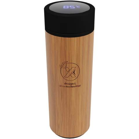 Double-walled vacuum insulated stainless steel and bamboo bottle with a temperature sensor on top of the lid, which displays the temperature of the drink inside the bottle (degrees Celsius). Keeps drinks hot for 8 hours or cold for 12 hours. Comes with a tea filter. Capacity: 500 ml. Delivered in a gift box. 