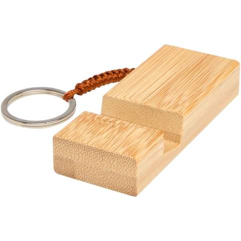 The Bosona phone holder with keychain is designed for convenience and style, and is crafted from responsibly sourced bamboo. This versatile holder keeps your phone secure while allowing easy access, making it perfect for on-the-go lifestyles. Attach it to your keys for effortless portability.
