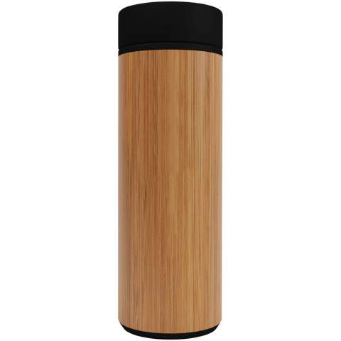Double-walled vacuum insulated stainless steel and bamboo bottle with a temperature sensor on top of the lid, which displays the temperature of the drink inside the bottle (degrees Celsius). Keeps drinks hot for 8 hours or cold for 12 hours. Comes with a tea filter. Capacity: 500 ml. Delivered in a gift box. 