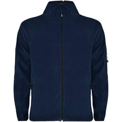 Veste en micropolaire pour un usage quotidien, avec col montant, manches longues et lizeré contrasté. Poche avec fermeture zippée contrastée sur la manche gauche et fermeture zippéecontrastée sur le devant. Coutures latérales et poitrine. Coudières ton sur ton.       