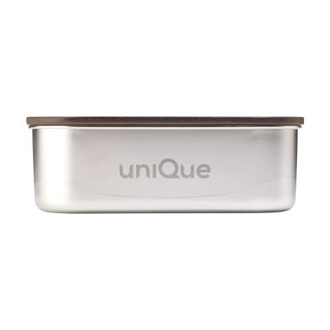 WoW! Boîte à lunch en acier inoxydable recyclé. Le superbe couvercle, en bois d'acacia, se ferme parfaitement grâce au joint d'étanchéité en silicone, pour que votre déjeuner reste frais plus longtemps. L'Acacia est un bois robuste et solide à l'aspect chaleureux. Cette boîte à lunch haut de gamme, à la fois élégante et pratique, est fabriquée avec des matériaux de qualité et se ferme avec une bande élastique et un velcro. Ne passe pas au lave-vaisselle. Capacité 1.700 ml. Certifié RCS. Matière recyclée totale : 45%.     L'inox peut être recyclé de nombreuses fois tout en conservant en grande partie la qualité du matériau. En utilisant de l'acier inoxydable recyclé, on a besoin de moins de nouvelles matières premières. Cela signifie moins de consommation d'énergie et moins d'utilisation d'eau. Chaque article est fourni dans une boite individuelle en papier kraft marron.