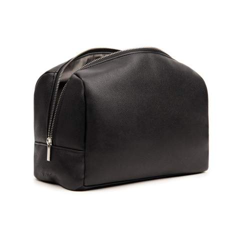 Effortlessly organise your travel essentials with our spacious toiletry bag. Designed with a clean and simple aesthetic, it's made from recycled PU and lining in accordance with RCS standards. The zipper along the short ends allows for easy access to the entire bag, making it convenient for on-the-go use. Certified by RCS (Recycled Claim Standard), RSC certification guarantees that the entire supply chain of the recycled materials is certified. The total recycled content is based on the overall product weight. This product contains 32% RCS-certified recycled polyester and 11% RCS-certified recycled PU