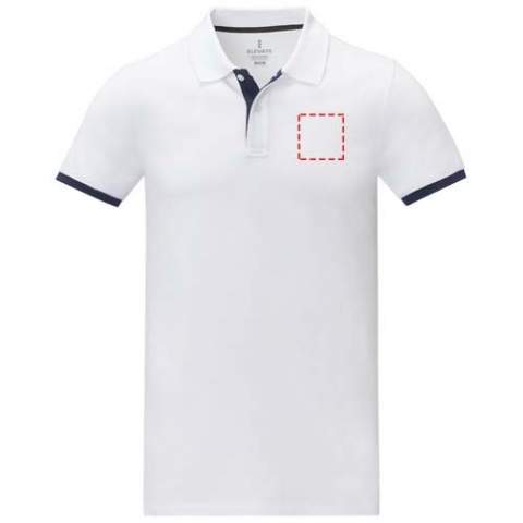 The Morgan short sleeve men's duotone polo is a stylish and comfortable option for any casual or business setting. Made from a 200 g/m² piqué knit cotton fabric, this polo is both durable and breathable. Featuring a flat knit collar and rib cuffs with contrast colour detailing, this polo offers a modern twist on a classic design. The two-button placket and pick-stitch details add an extra touch of sophistication, and the satin neck tape and heat transfer main label provide comfort and ease of wear. 
