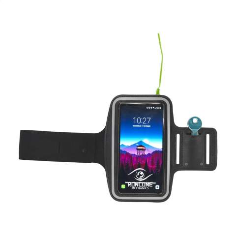 Adjustable sports bracelet made of elastic, flexible and wear-resistant material. With velcro fastening, special key pouch and transparent telephone cover with a fluorescent frame so you’re more visible in the dark. Dims. frame 7,5 x 14,5 cm.