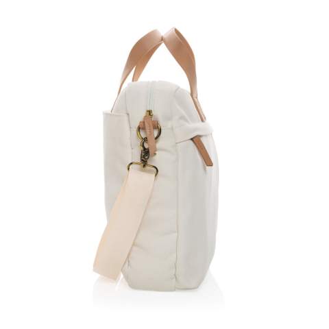 Maak het dagelijkse woon-werkverkeer een beetje makkelijker en een stuk stijlvoller met deze 16oz. laptoptas van gerecycled canvas. Deze tas heeft een gewatteerd 15,6-inch laptopvak en een ruim voor- en achtervak voor je andere dagelijkse benodigdheden. 2% van de opbrengst van elk verkocht Impact-product wordt gedoneerd aan Water.org. Samenstelling 60% gerecycled katoen en 40% gerecycled polyester Voering van 150D gerecycled polyester.<br /><br />FitsLaptopTabletSizeInches: 15.6<br />PVC free: true