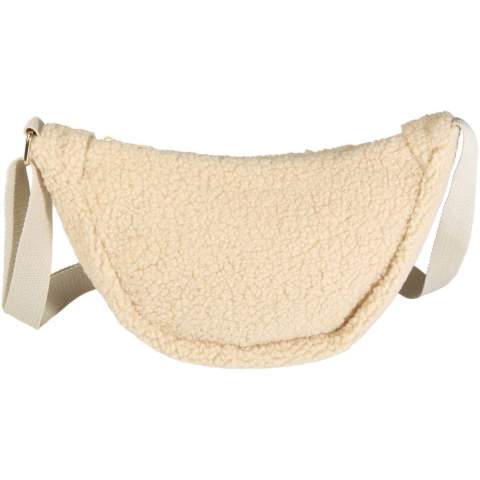 The Bear sherpa crossbody bag is made from GRS certified recycled polyester. It features a spacious main compartment and with its adjustable shoulder straps it is a perfect bag for everyday use.

