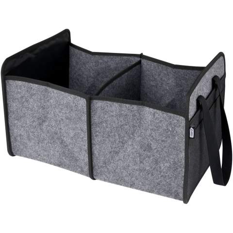 Foldable trunk organiser made of soft and durable high quality GRS certified recycled felt. Features 2 large compartments with fortified bottom plates, front pocket, mesh pocket and 2 long woven cotton handles (30 x 2.5 cm). Ideal for storing the charging cables of your electric vehicle, carrying your groceries or just keeping everything well organized in your car or at home. Folds into place without any effort and an elastic strap ensures it stays folded neatly. Depth closed: 4.5 cm. Depth open: 48 cm. 