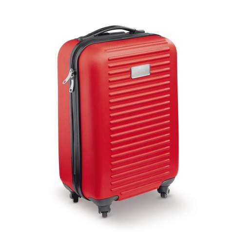 Cabin size trolley with one main compartment with grey lining. The suitecase has a double zipper and four spinner wheels. Metal plate for printing. Individually packed in a box.