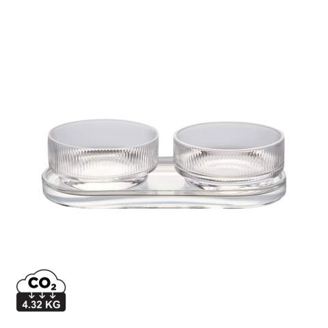 A tapas set with timeless design and classic, clean lines. Perfect for any occasion where you want to serve small dishes, snacks, or other sides with style and elegance. The set includes two bowls and a tray, which can be used together or separately. Made from soda-lime glass. The bowls hold 250 ml. Dishwasher safe.