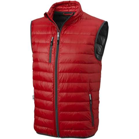 The Fairview men's lightweight down bodywarmer – perfect functionality to elevate your outdoor attire. This bodywarmer features elasticated binding on the bottom, offering a comfortable and slightly tight fit that adds protection against chilly winds. The outer shell fabric is made of nylon dull cire 20D woven with a water-repellent finish, ensuring exceptional durability and good protection against the elements. The lightweight material allows for easy movement and effortless wear throughout the day. The downproof pressed fabric prevents the down and feathers from escaping, ensuring long-lasting warmth and an extra level of durability. The down insulation is RDS certified (Responsible Down Standard), consisting of down and feathers, providing lightweight warmth without compromising ethical standards. A reliable companion for any outdoor adventure.