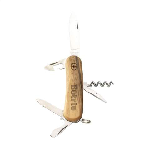Original Swiss Army Knife from Victorinox with walnut handle. Each knife is unique thanks to the natural grain of the wood. The intermediate plates are made of hard-anodized aluminum and the tools are made from 100% recycled steel. 6-piece with 11 functions: large knife, nail file, corkscrew, can opener with small screwdriver 3 mm, bottle opener with large screwdriver 6 mm, wire stripper, reamer with punch and sewing awl and key ring. Includes instruction manual and lifetime warranty on material and manufacturing defects.     Victorinox knives are a worldwide symbol for reliability, functionality and perfection. Please note local rules may apply regarding the possession and/or carrying of knives or multitools in public. Packed individually.