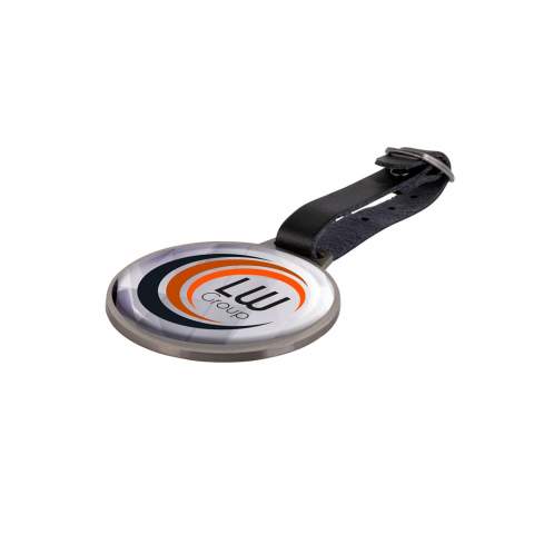 Metal bag tag circular with a faux-leather strap. Provided with a doming