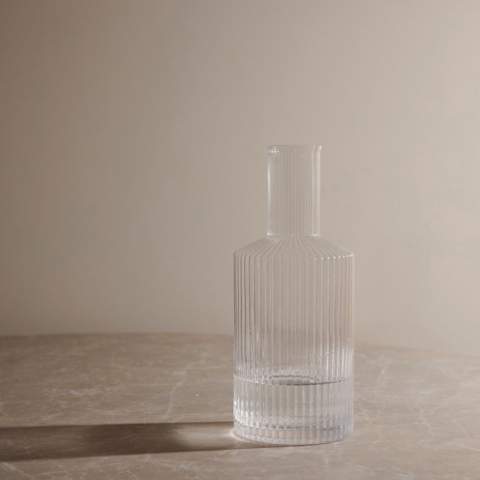 A carafe created with timeless design and classic, elegant lines. Perfect for any occasion where you want to serve refreshing drinks with style. The carafe creates a sophisticated atmosphere at the dinner table or other festive occasions. Ideal for water, juice and other cold beverages. Made of soda-lime glass. The carafe holds 1450 ml and is dishwasher safe. Cold drinks only.