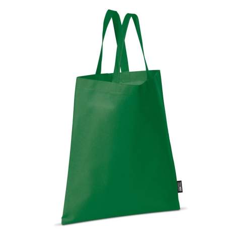 Farbige Non-Woven Tragetasche mit kurzen Griffen. Große Druckfläche.