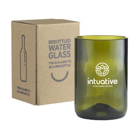 A design drinking glass made from an upcycled wine bottle. A unique glass by the Rebottled® brand, in which you immediately recognise the original wine bottle. The glass fits comfortably in your hand and has a smooth finish. Of high quality and suitable for water, soft drinks or cocktails. Dishwasher-safe up to 60C°. Washing by hand is recommended to preserve the imprint. Per piece delivered in an original gift box made from recycled FSC®-certified cardboard. Dutch design. Made in Holland. Capacity approx. 400 ml. Imprint only possible in black or white.     Rebottled® upcycles empty wine bottles into 100% circular design items.