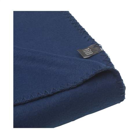 WoW! Fleece throw made from 30% polyester and 70% RPET polyester (180 g/m²). RPET polyester is a durable and environmentally friendly material made from recycled PET bottles and recycled textile fibres. Supplied with a handy carrying loop. OEKO-TEX® certified. Dimensions when unfolded 150 x 120 cm.