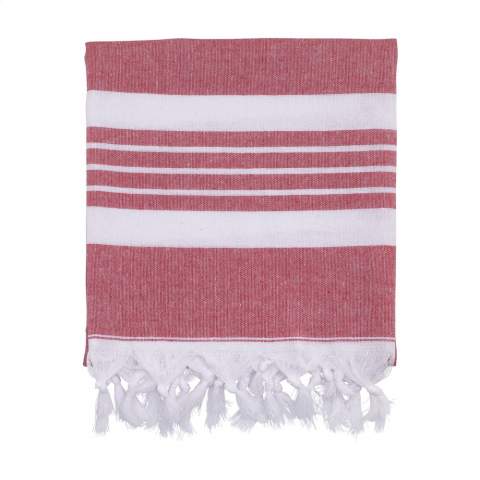 A multifunctional hammam towel from Oxious. Made from 50% Oekotex certified cotton and 50% recycled industrial textile waste and fabrics. Promo is a wonderfully soft and stylish cloth with a white stripe pattern.
Beautiful as a shawl, dress on the couch, luxurious (hammam) cloth or towel. The cloth is handmade.
These beautiful, soft cloths are made by local women in a small village in Turkey. They work there in a social context, with room for growth and development. The cloths are handmade with love and care for the environment. Pure enjoyment can begin with a product from the Oxious collection. Optional: Each item supplied in a kraft cardboard envelope and/or with a kraft sleeve.