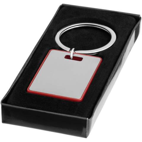 Klassischer rechteckiger Schlüsselanhänger mit farbigem Rahmen. Inkl. schwarzer Geschenkverpackung.