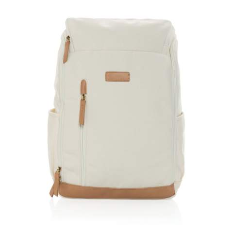 Sac à dos ordinateur en toile composé de 60% coton recyclé et 40% polyester recyclé avec doublure en polyester recyclé 150D. Avec poche frontale verticale profonde et une fermeture à zip qui révèle un intérieur spacieux avec un compartiment pour ordinateur portable 15". Le traceur AWARE™ qui prouve l'utilisation authentique de la toile recyclée. 2% de chaque vente de produit Impact vendu sera versée en don à Water.org.<br /><br />FitsLaptopTabletSizeInches: 15.0<br />PVC free: true