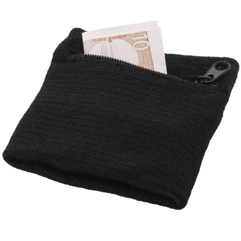 Ce poignet éponge en coton dispose d'un compartiment zippé pour ranger votre argent pendant une activité sportive, durant vos courses ou un voyage.