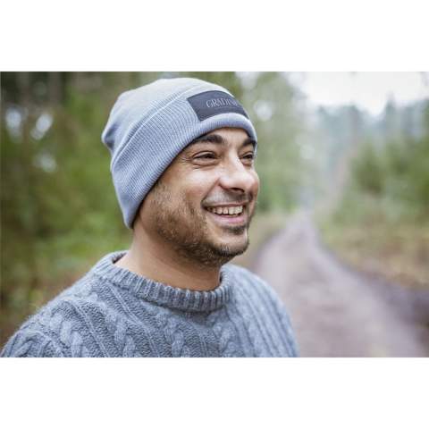 WoW! Knitted hat with fold over. Made from 100% RPET polyester. A popular item, keeps you nice and warm with good quality material. One-size. With black label for decoration. GRS-certified. Total recycled material: 100%.
