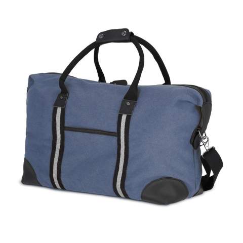 Stylish weekend bag made from recycled cotton canvas. Features 100% recycled reflective webbing, luxurious zips and pulls, and 100% recycled polyester lining. Includes an adjustable removable shoulder strap, 1  front pocket, and 2 interior pockets, one with a zip.