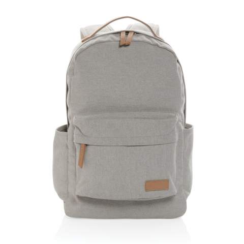 This 16oz. recycled canvas backpack is a classic for everyday use . This bag features a padded 15.6"laptop pocket and a spacious front and back pocket to hold your other daily essentials. Each laptop bag saves 2506.2 litres of water. 2% of proceeds of each Impact product sold will be donated to Water.org. Composition 60% recycled cotton and 40% recycled polyester. Lining in 150D recycled polyester.